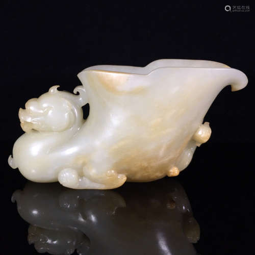 A HETIAN JADE CARVED DRAGON PATTERN CUP