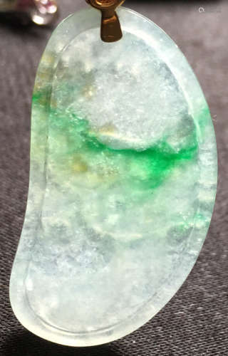 A THREE COLOR JADEITE CARVED PENDANT, TYPE A