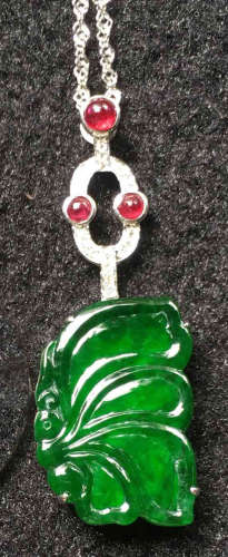 A GREEN JADEITE CARVED BUTTERFLY PENDANT, TYPE A