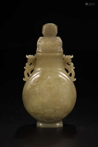 A HETIAN JADE CARVED BEAST PATTERN EAR BOTTLE