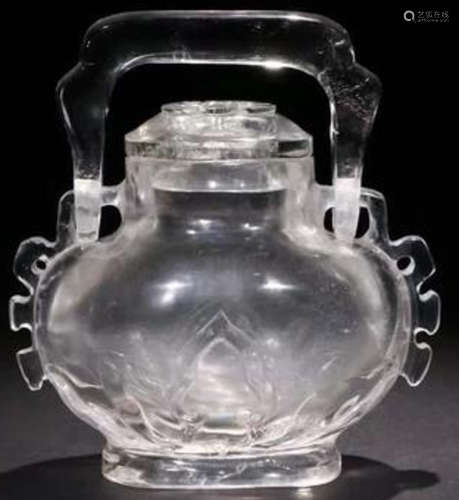 A CRYSTAL CASTED LIFTING BOTTLE
