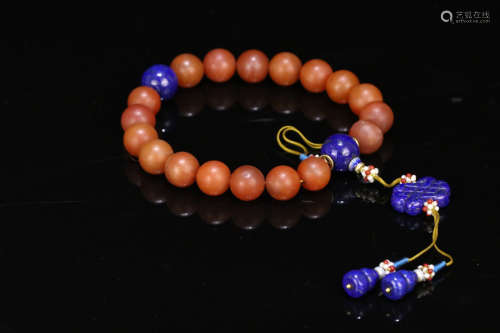 A RED AGATE BEADS STRING BRACELET