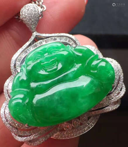 A GREEN JADEITE CARVED BUDDHA PENDANT, TYPE A