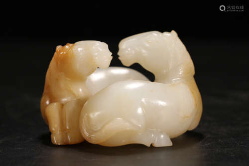 A HETIAN JADE CARVED HORSE SHAPED PENDANT