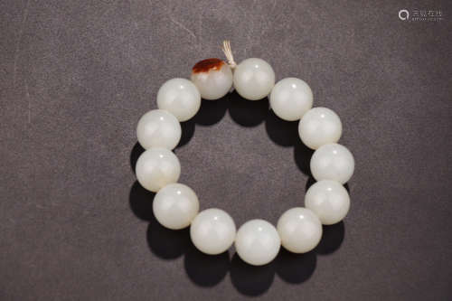 A HETIAN JADE BEADS STRING BRACELET