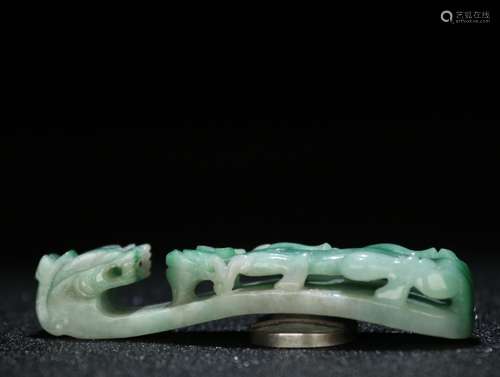 A JADEITE DRAGON STORY SHAPED CARVED ORNAMENT