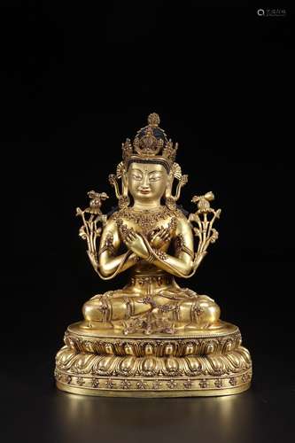 A GILT BRONZE DU MU BUDDHA