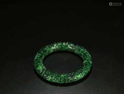 A JADEITE FLOWER PATTERN CARVED BANGLE