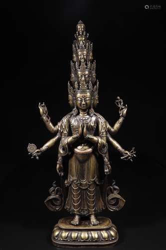 A GILT BRONZE 11 FACES 8 ARMS BUDDHA