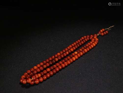 A  108 BEADS  AMBER BUDDHA  NECKLACE