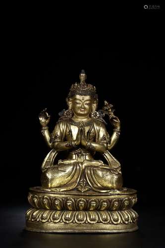 A GILT BRONZE FOUR ARMS GUANYIN BUDDHA