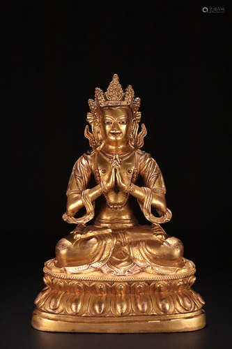 AN OLD TIBETAN GILT BRONZE GUANYIN STATUE.