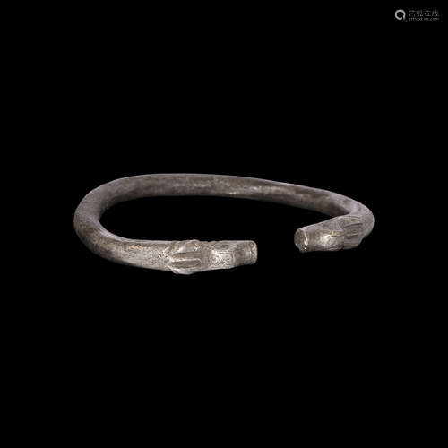 Western Asiatic Silver Bracelet with Animal Head Terminals