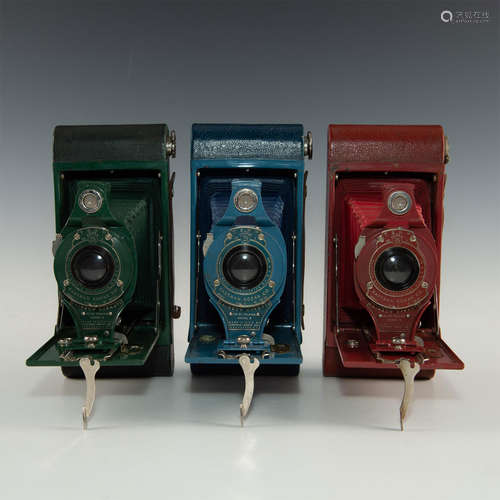 TRIO OF RAINBOW MULTICOLORED KODAK FOLDING CAMERAS