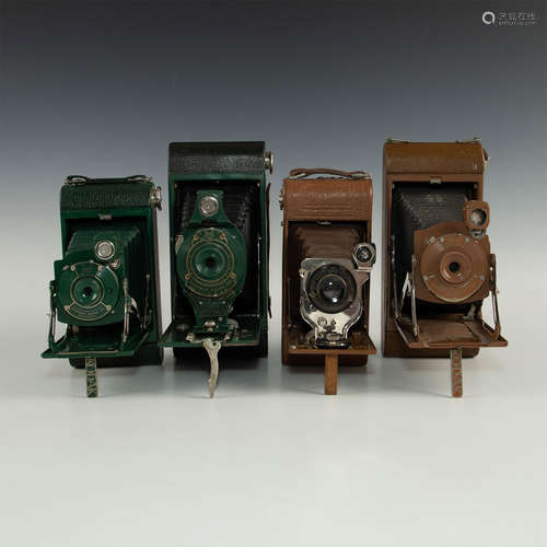 GROUP OF FOUR TAN AND GREEN FOLDING CAMERAS