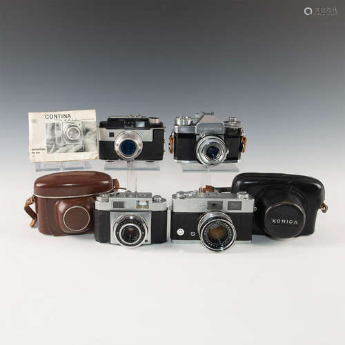 LOT OF 4 CURIOUS CHROME AUTOMATIC CAMERAS