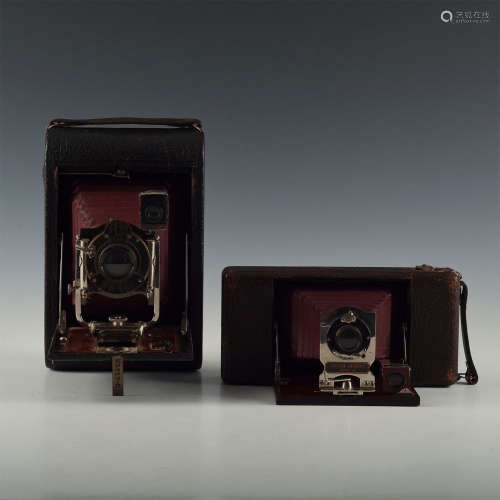 PAIR RICHLY APPOINTED WOOD AND CORDOVAN LEATHER CAMERAS