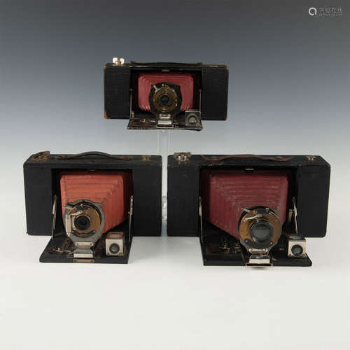 TRIO OF RARE RED LEATHER ANTIQUE FOLDING FILM CAMERAS