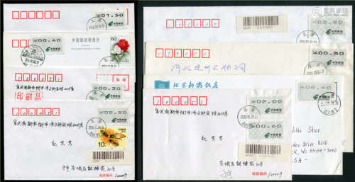 2000-01年贴用北京电子邮票实寄封片一组8件，邮票资费面值包括：印刷品0.30元；平信0.80元（寄香港平信1.50元）；国内挂号2.80元；国际航空6.40元；本市挂号混贴2.50元、2.0元和0.60元；寄台湾邮资明信片加贴0.40元。实用例品种较齐全。