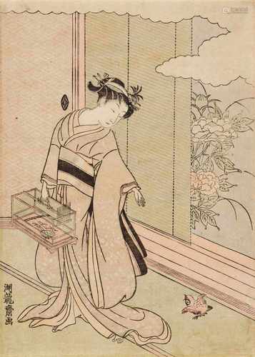 Isoda Koryûsai (1735-1790)Chûban. A beauty encouraging a bird into a cage. Signed: Koryûsai ga.