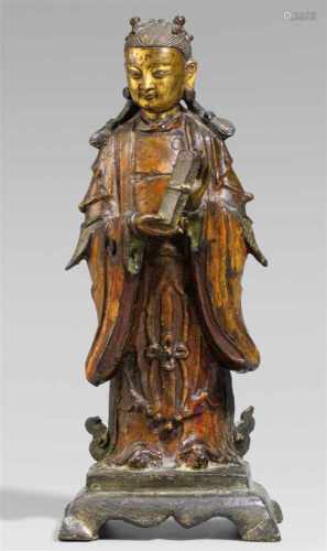 Weibliche Begleitfigur einer daoistischen Gottheit. Teilweise vergoldete Bronze. 17./18. Jh.