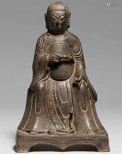 Wenwu, der Gott des Nordens. Bronze. Späte Ming-ZeitMit langen offenen Haaren, breitbeinig auf einer