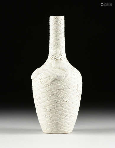 A CHINESE BLANC DE CHINE DRAGON RELIEF VASE, IMPRESSED MARK, LATE 20TH CENTURY, of mallet form