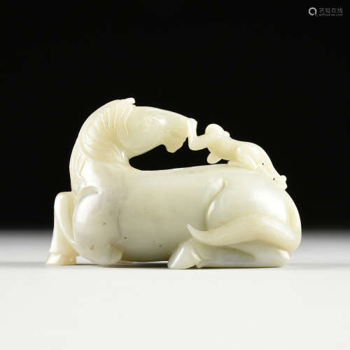 A CHINESE CARVED CELADON JADE MONKEY AND HORSE GROUP, 20TH CENTURY, in the Ming style and nicely