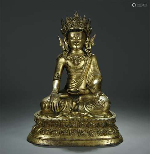 Large antique gilt bronze figure of Sakyamuni