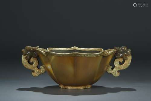 A gold mounted two handle agate bowl