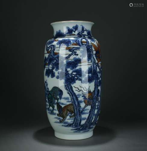 A large blue/white vase, marked