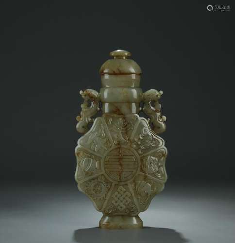 An old celadon jade carved covered vase