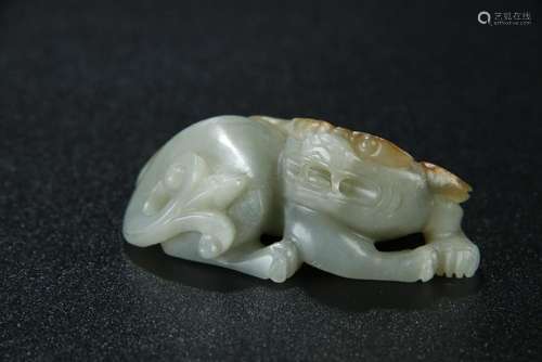 A nice celadon jade carved beast figure