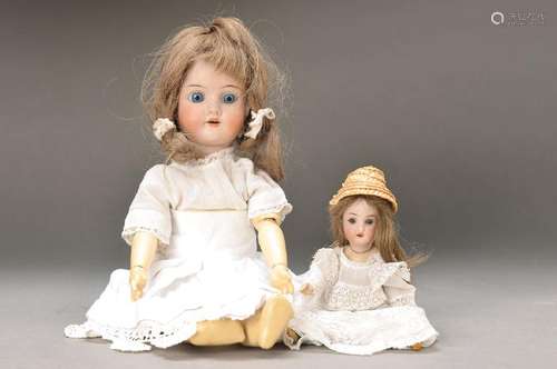 2 porcelain head dolls, German, around 1910- 20, 1 of