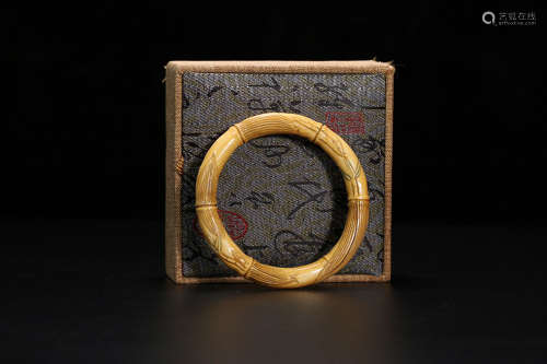 A BAMBOO BRACELET CRAVED WITH DETAIL