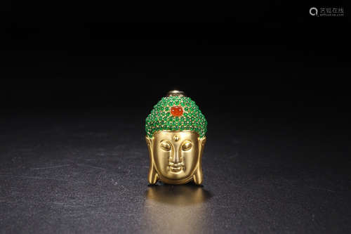 A 18K GOLD JADEITE BUDDHA HEAD PENDANT