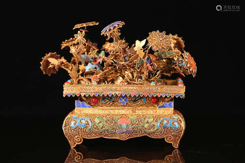 A GILT BRONZE FLORAL BONSAI WITH BLUING DETAIL EMBEDED WITH GEM