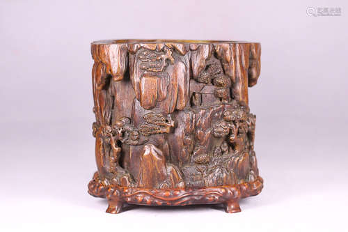 A CHENXIANG WOOD PEN HOLDER WITH SCULPTURE