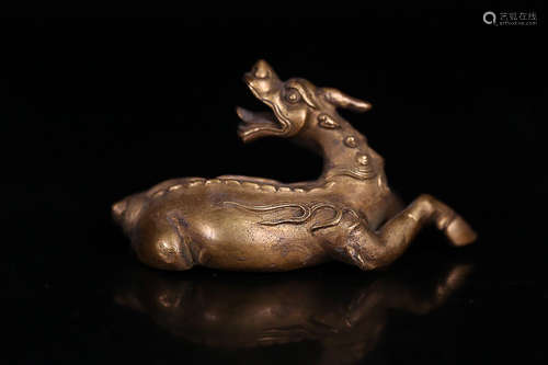 A BRONZE DRAGON PAPER WEIGHT