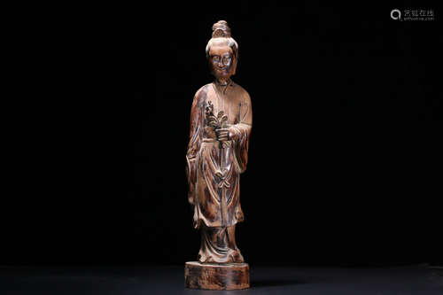 A LONGYAN WOOD FEMALE CHARACTER STANDING STATUE