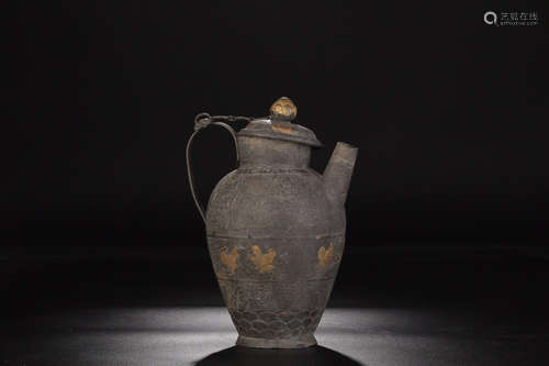 A GILT SILVER POT WITH FLORAL AND BIRD PATTERN