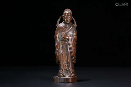 A CHENXIANG WOOD CHARACTER STATUE