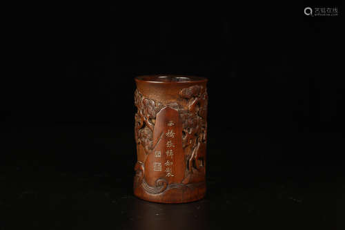 A BAMBOO PEN HOLDER WITH STORY PATTERN