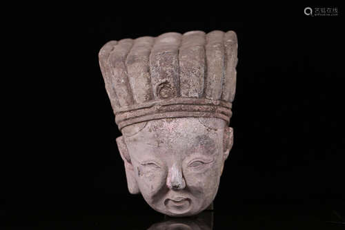 A SAND STONE CRAVED BUDDHA HEAD