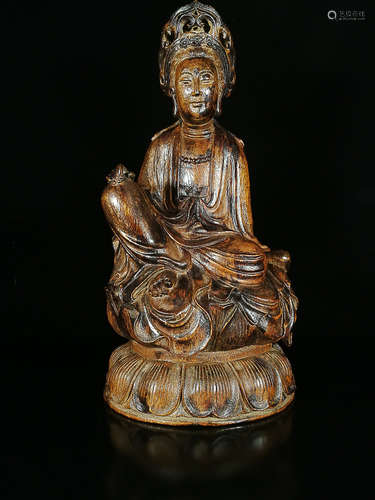 A CHENXIANG WOOD GUANYIN SHAPED ORNAMENT