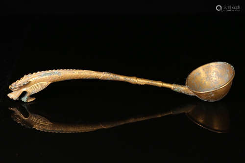 A GILT BRONZE DRAGON HEAD SPOON