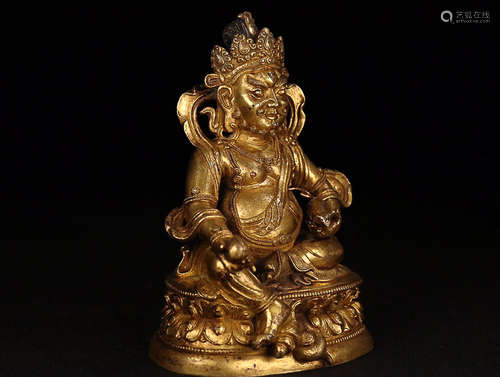 A GILT BRONZE CAISHEN SHAPED ORNAMENT