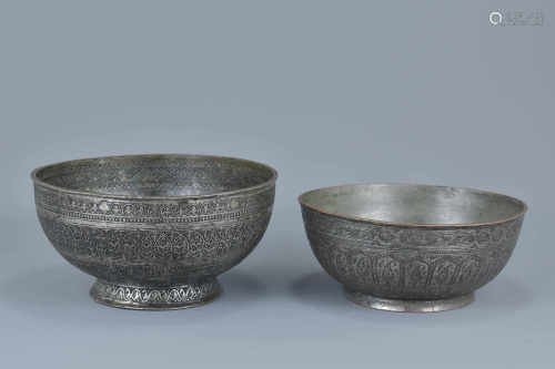 Two antique Persian metal bowls, one with mark and inscription. 19cm diameter