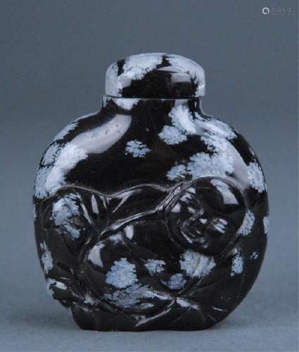 Obsidian snuff bottle.