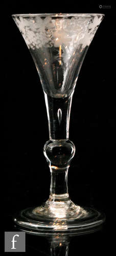 An 18th Century baluster Kit-Cat type drinking glass circa 1725,